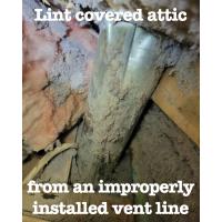 Lint covered attic from an improperly installed vent line. 